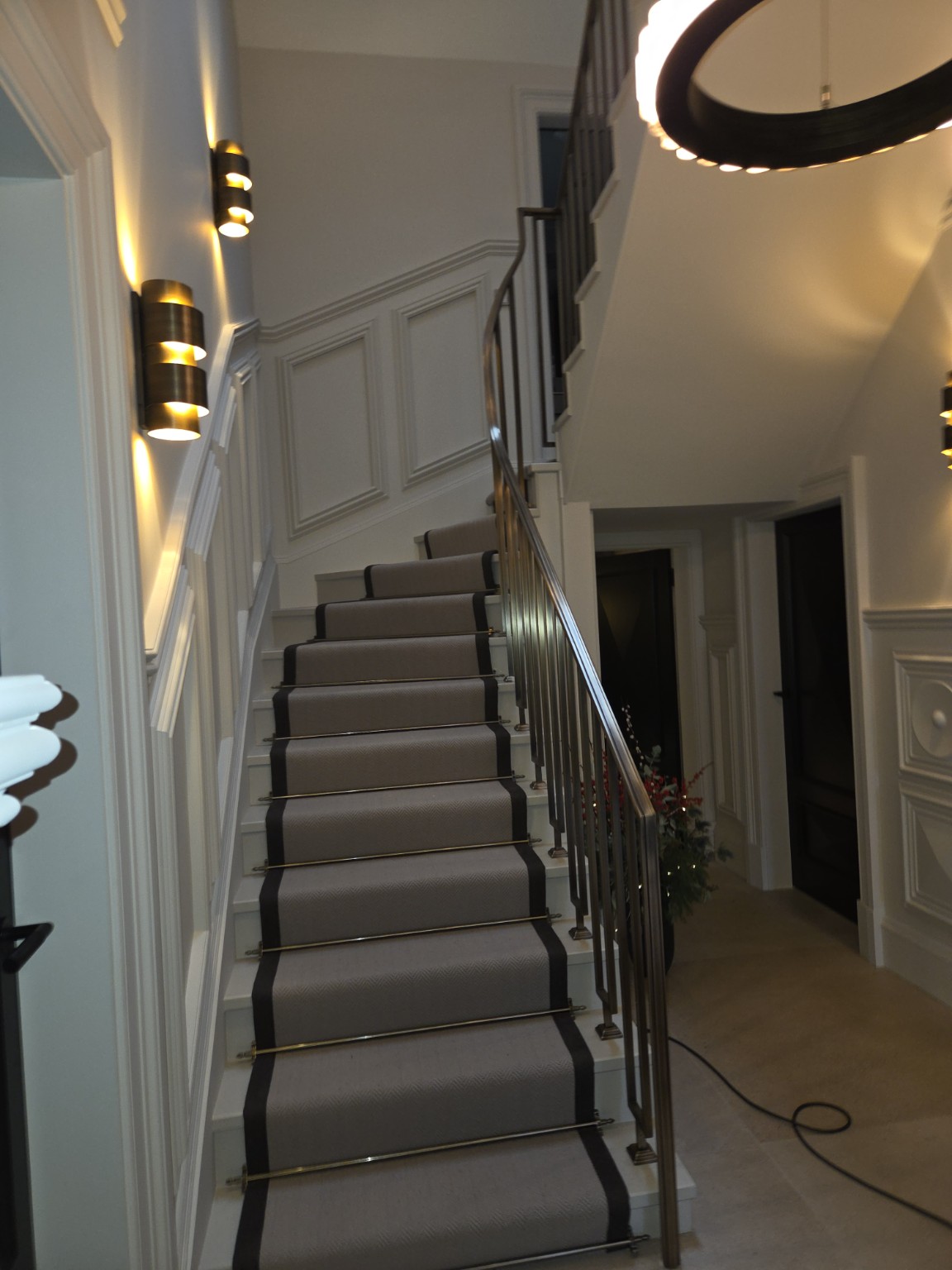 Staircase with bespoke metal balustrade and handrail